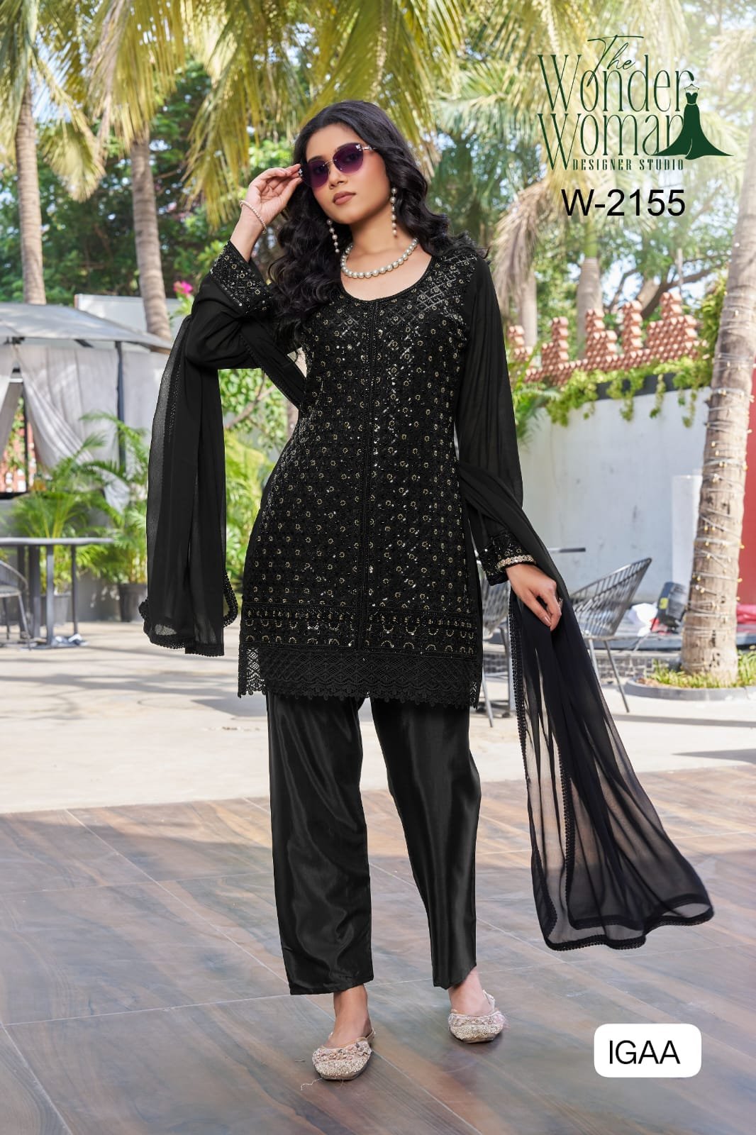 W-2155 Intricately detailed with heavy beads work and finished with a rich lace daman, this outfit is all about understated glamour.