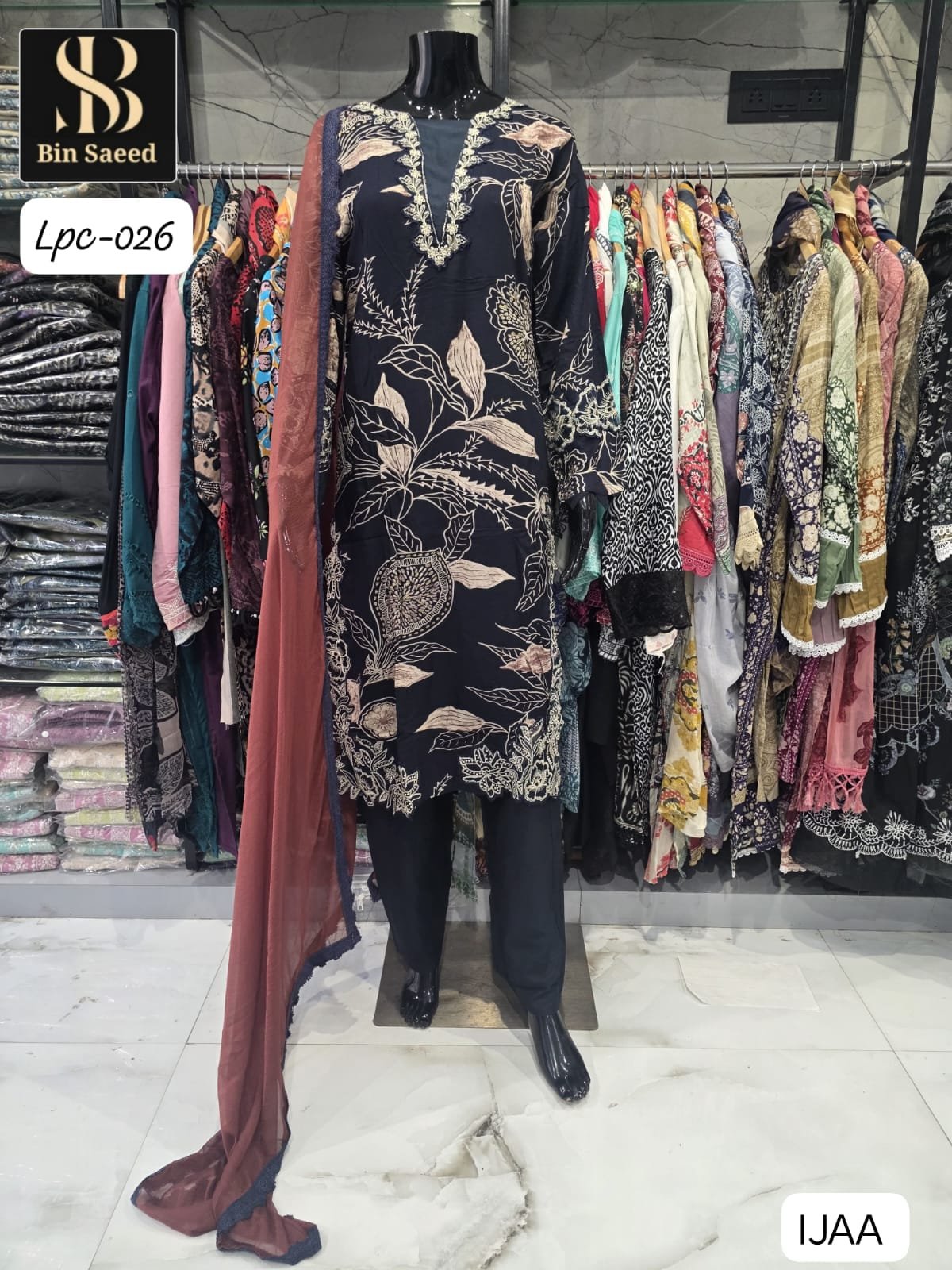 SUIT WITH HEAVY QUALITY RAYON WITH DISCHARGE PRINT WITH PATCH