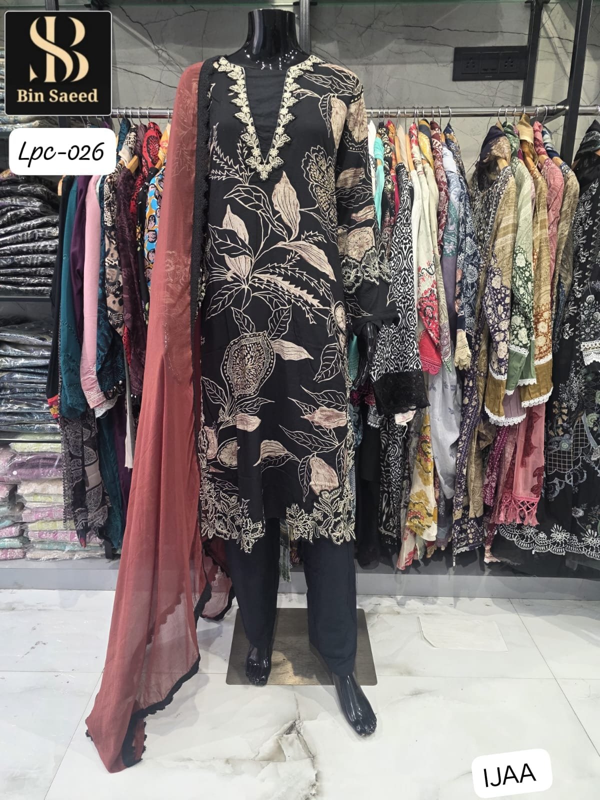 SUIT WITH HEAVY QUALITY RAYON WITH DISCHARGE PRINT WITH PATCH - Image 2
