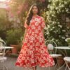 Crafted from soft cotton and designed with a graceful tiered flare, this floral midi dress brings effortless elegance and vibrant energy to your day. Perfect for brunches, festive outings, or sunny get-togethers — wear it, and let your confidence bloom