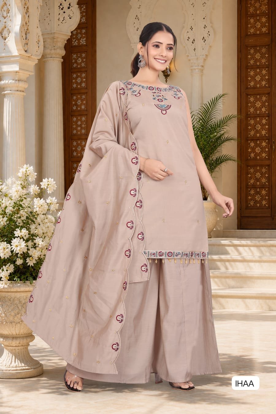 AK Suit Set WITH Featuring beautiful Heavy Sleeveles Suit Set which is beautifully decorated Embroidered. It is paired with Plazzo Complet Lining with Beautiful work